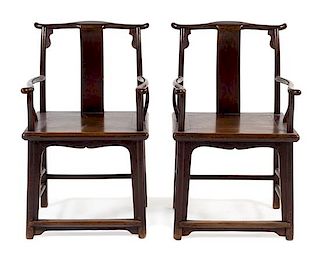 * A Pair of Chinese Lacquered Elmwood Official's Hat Armchais, Sichutouguanmaoyi Height 38 x width 52 1/2 x depth 17 1/2 inches.