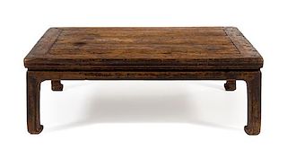 * A Chinese Elmwood Kang Table, Kangzhuo Height 11 1/2 x width 35 x depth 25 inches.