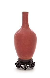 * A Chinese Sang-de-Boeuf Glazed Porcelain Vase Height 5 1/4 inches.