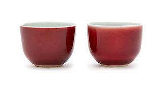 * A Pair of Chinese Sang-de-Boeuf Glazed Porcelain Cups Diameter of each 1 3/4 inches.