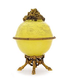 * A Chinese Gilt Bronze Mounted Yellow Glazed Porcelain Covered Vessel Height overall 8 3/4 inches.