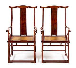 * A Pair of Chinese Huanghuali Official's Hat Armchairs, Sichutouguanmaoyi Each height 44 3/4 x width 24 1/2 x depth 20 inches.