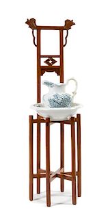 * A Chinese Huanghuali Basin Stand, Mianpenjia Height 52 x width 15 1/4 x depth 13 inches.