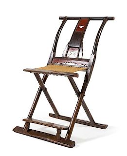 * A Chinese Elmwood Folding Chair, Jiaoyi Height 37 1/4 x width 22 1/2 x depth 27 inches.