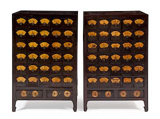 * A Pair of Chinese Huanghuali Inset Elmwood Apothecary Cabinets, Yaogui Each height 43 x width 28 1/4 x depth 19 1/2 inches.