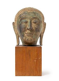 * A Thai Bronze Head of Buddha Height 6 3/4 inches.