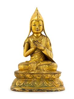 A Sino-Tibetan Gilt Copper Repousse Figure of Tsongkapa Height 12 1/2 inches.
