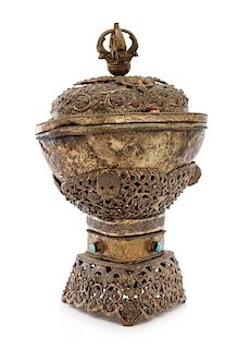 A Tibetan Silvered Metal Mounted Hardstone Embellished Kapala Cup and Cover Height 11 1/2 inches.
