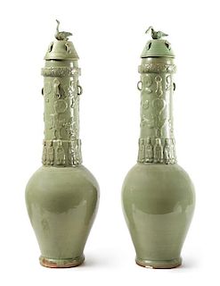 A Pair of Longquan Celadon Glazed Porcelain Funerary Urns and Covers Hight 33 inches.