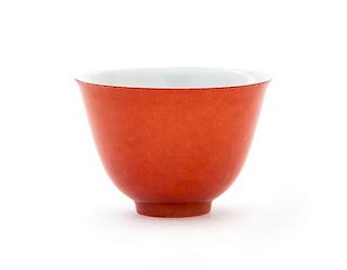 A Red Glazed Porcelain Cup Height 1 3/4 inches.