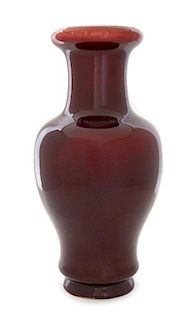 A Sang-de-Boeuf Glazed Porcelain Vase Height 16 3/4 inches.