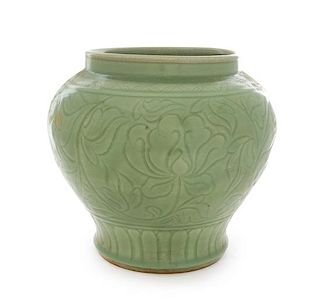 A Large Longquan Celadon Glazed Porcelain Jar Height 11 3/4 inches.