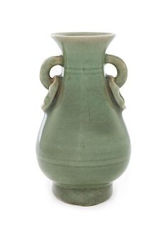 A Longquan Celadon Glazed Porcelain Vase Height 6 1/4 inches.