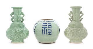 * A Matched Pair of Longquan Celadon Porcelain Vases Height of tallest 11 1/2 inches.