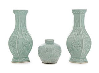 Three Carved Celadon Glazed Porcelain Vessels Height of tallest 11 1/8 inches.
