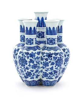 A Blue and White Porcelain Six-Spouted Vase Height 7 1/4 inches.