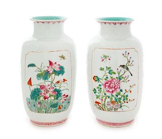 A Pair of Famille Rose Porcelain Vases Height 9 inches.