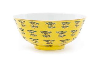 * A Large Yellow Ground Green and Gilt Decorated Porcelain Bowl Diameter 7 3/4 inches.