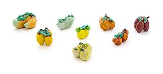 Eight Enameled Porcelain Models of Fruits and Vegetables Length of largest 3 inches.