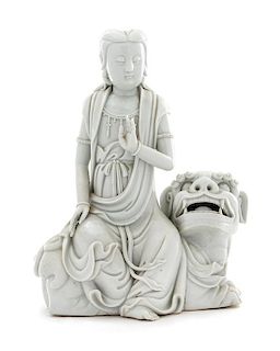 * A Blanc-de-Chine Porcelain Figure of Guanyin Height 10 1/4 inches.