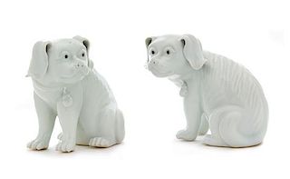 A Pair of Chinese Export White Glazed Porcelain Dogs Height 6 1/4 inches.