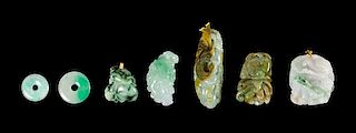Seven Jadeite Pendants Length of largest 2 3/4 inches.