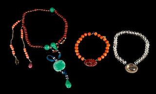 * Three Hardstone and Glass Necklaces Length of longest 41 1/4 inches.