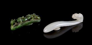 Two Carved Jade Belt Hooks Length of larger 3 1/2 inches.