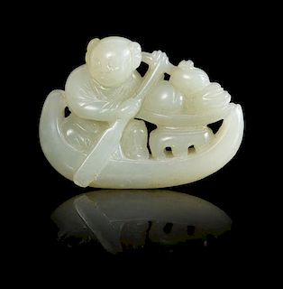* A Pale Celadon Jade Model of a Boy on a Boat Length 2 3/8 inches.