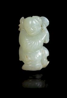 * A Pale Celadon Jade Figure of a Boy Height 1 7/8 inches.