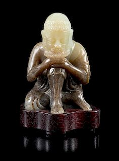 A Black and White Jade Figure of a Damo Height 3 1/2 inches.