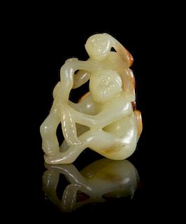 A Yellow and Russet Jade Monkey Group Height 2 inches.
