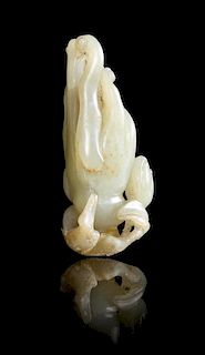 * A Pale Celadon Jade Carving of a Buddha's Hand Citron Height 3 inches.