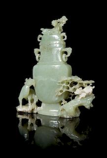 A Pale Celadon Jade Covered Vase Height 7 1/4 inches.