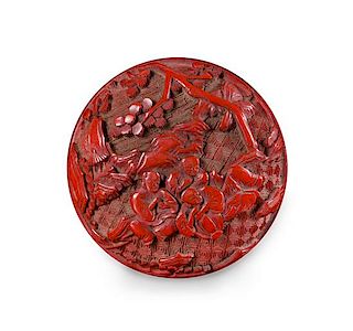 * A Small Carved Red Lacquer Circular Covered Box Diameter 2 1/4 inches.