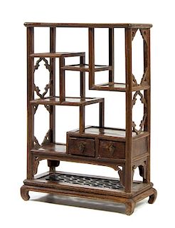 A Jichimu Wood Displaying Cabinet, Duobaoge Height 26 1/4 x width 17 1/4 x depth 7 3/4 inches.