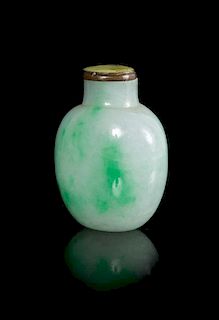 A Celadon and Apple Green Jadeite Snuff Bottle Height 2 1/4 inches.