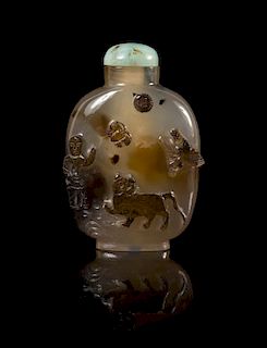 * A Carved Silhouette Agate Snuff Bottle Height 2 1/2 inches.