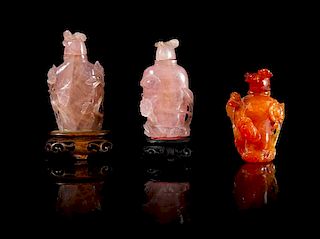 * Three Carved Hardstone Snuff Bottles Height of tallest 3 1/8 inches.