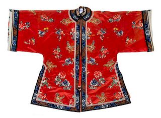 * A Chinese Red Ground Embroidered Silk Lady's Robe and A Lady's Skirt Length of robe (collar to hem) 45 inches.