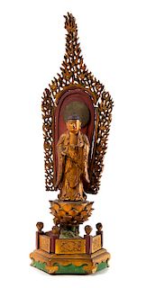 * A Japanese Gilt and Red Lacquered Wood Figure of Buddha Height 20 inches.