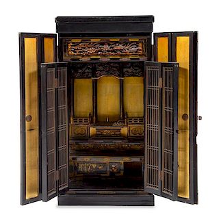 * A Japanese Lacquered Buddhist Shrine Height 47 3/4 x width 18 1/2 x depth 14 1/4 inches.