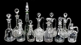 A Collection of Cut Glass Decanters, Height of tallest 17 inches.