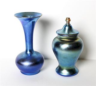 A Durand Iridescent Glass Jar, Height of taller 9 1/2 inches.