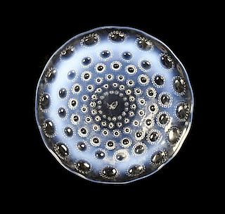 A Lalique Molded and Frosted Opalescent Glass Charger, Diameter 10 7/8 inches.