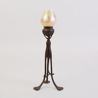 Tiffany Studios Patinated-Bronze Tripod Candlestick and a Favrile Glass Shade 