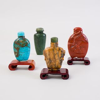 Four Chinese Carved Hard Stone Snuff Bottles