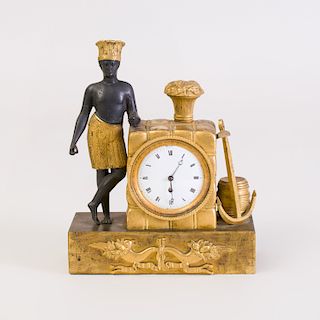 Charles X Parcel-Gilt Bronze Clock with Figure Emblematic of North America