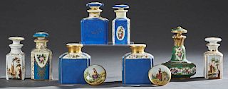 Group of Eight Old Paris Porcelain Perfume Bottles, 19th c., consisting of a blue pair with floral decoration and gilt figural painted stoppers; a whi