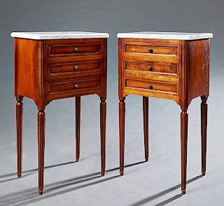 Pair of Louis XVI Style Carved Cherry Marble Top Nightstands, 20th c., the figured ogee edge white marble over three shadow drawers flanked by reeded 